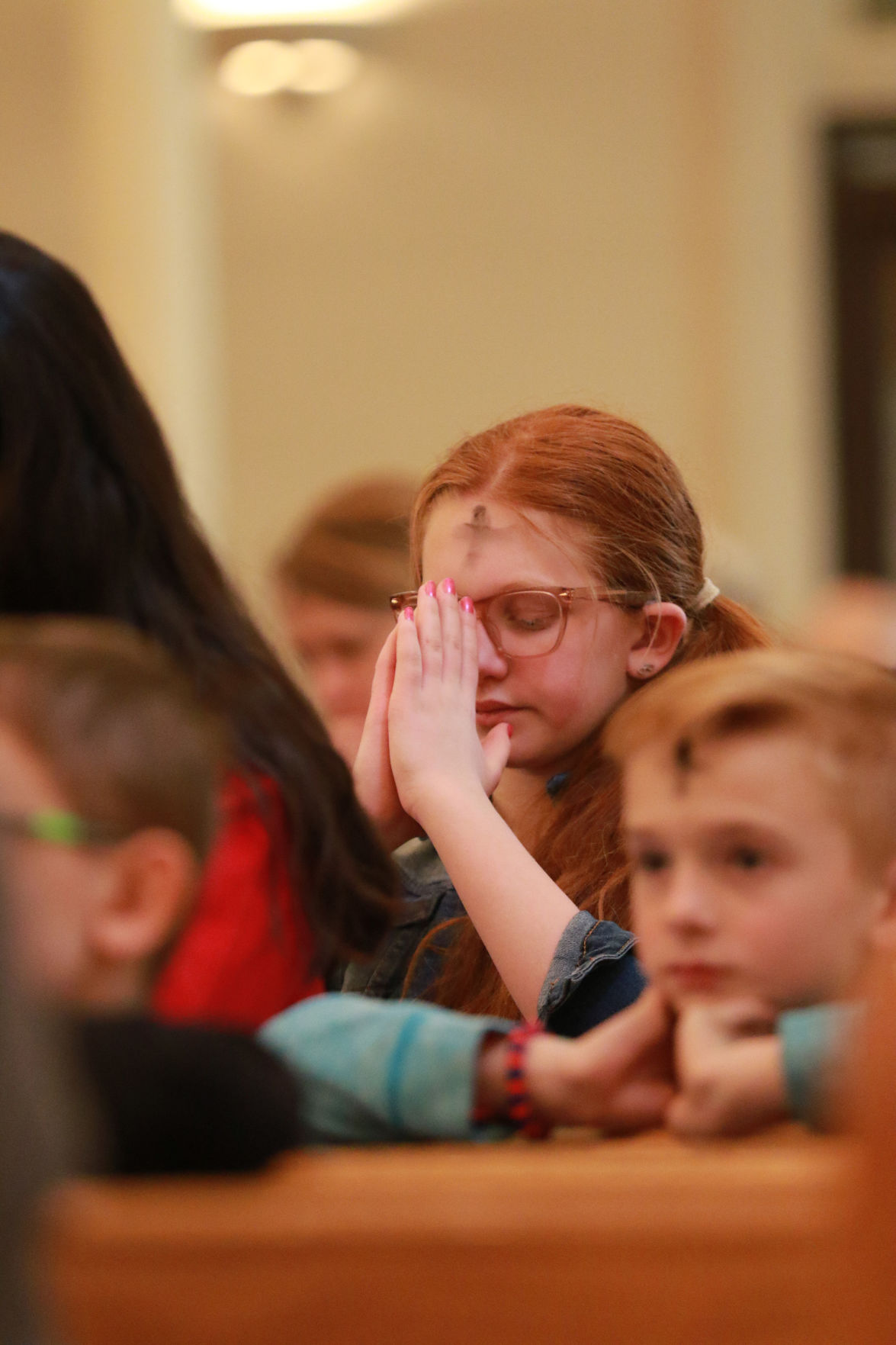 PHOTOS: Ash Wednesday noon service St. Agnes